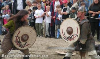 Woman in Battle with Sword and Shield
